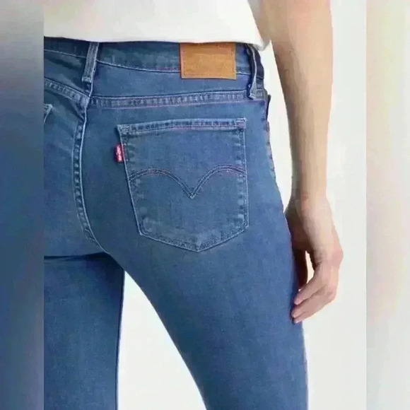 LEVIS Premium 711 Mid Rise Skinny Jean with Raw Hem in Light Wash - Picture 13 of 13